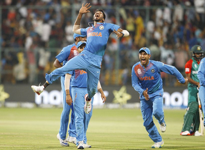 India's Hardik Pandya jumps to celebrate India's win against Bangladesh in the ICC World Twenty20 2016 cricket match in Bangalore, India, Wednesday, March 23, 2016. (AP Photo/Aijaz Rahi)