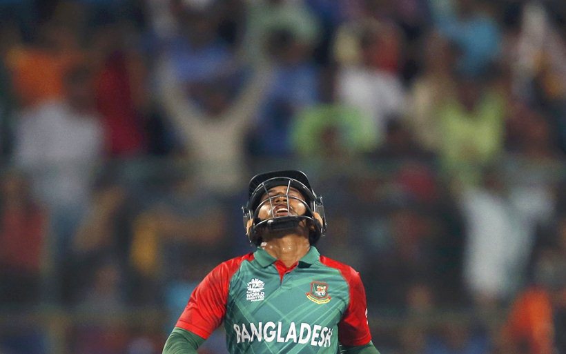 Cricket - India v Bangladesh - World Twenty20 cricket tournament - Bengaluru, India, 23/03/2016. Bangladesh's Mushfiqur Rahim reacts after his dismissal. REUTERS/Danish Siddiqui