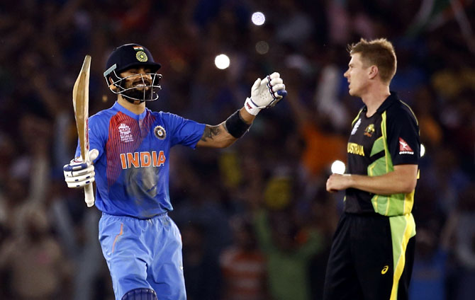 India's Virat Kohli celebrates after winning their match. (REUTERS)