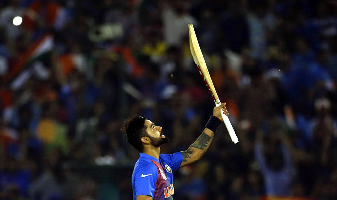 India's Virat Kohli celebrates after winning their match. (REUTERS)