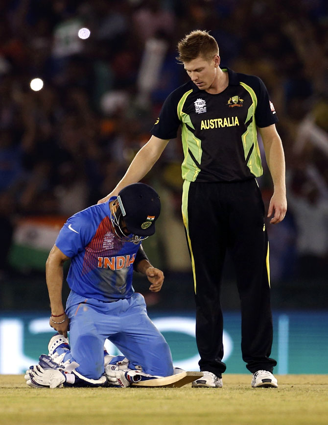 India's Virat Kohli (L) is congratulated by Australia's James Faulkner after India won the match. (REUTERS)