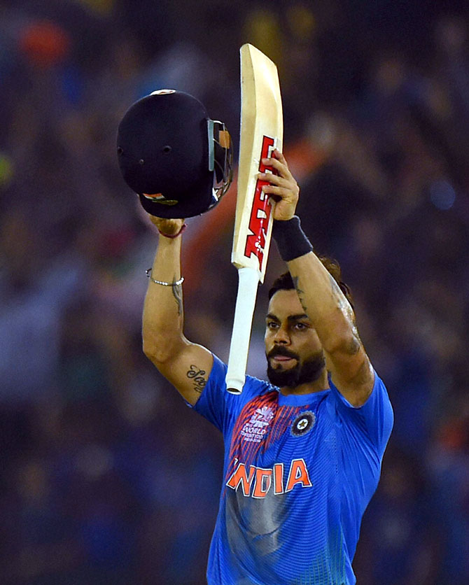 India's Virat Kohli celebrates after winning their match. (REUTERS)