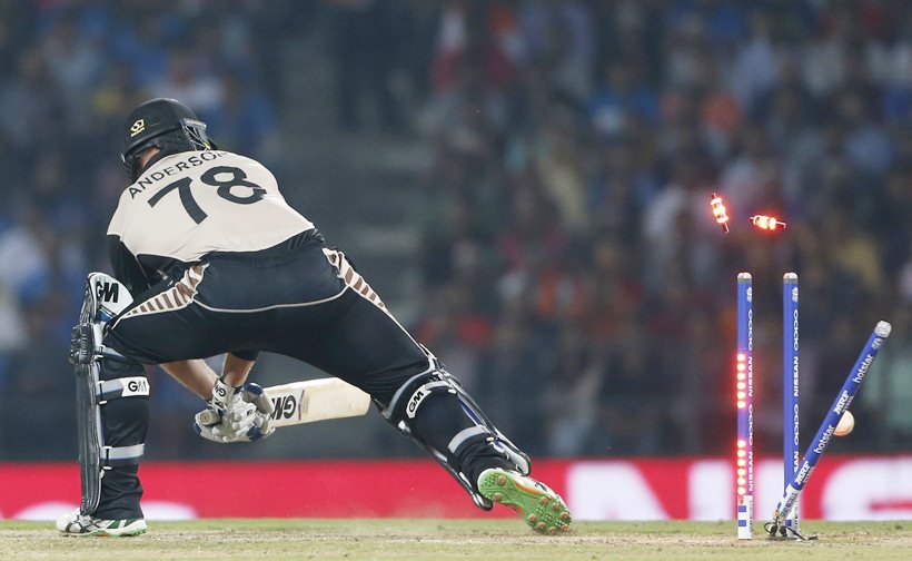 New Zealand's Corey Anderson is bowled by India's Jasprit Bumrah during the ICC World Twenty20 2016 cricket match at the Vidarbha Cricket Association stadium in Nagpur, India, Tuesday, March 15, 2016. (AP Photo/Saurabh Das)