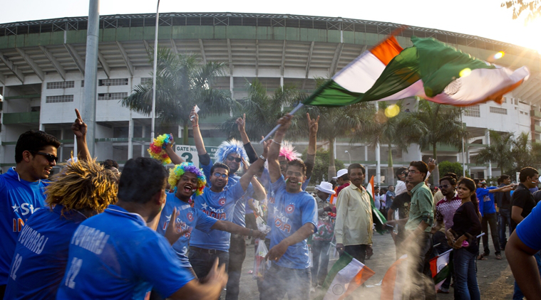 Indian fans sing and dance before India's Twenty20 World Cup match against New Zealand outside the Vidarbha Cricket Association stadium in Nagpur, India, Tuesday, March 15, 2016. (AP Photo/Saurabh Das)