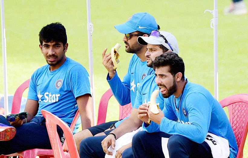 Bengaluru: Cricketers Jasprit Bumrah, M S Dhoni, Suresh Raina and Ravindra Jadeja during a training session at Chinnaswamy Stadium in Bengaluru on Tuesday. PTI Photo by Shailendra Bhojak (PTI3_22_2016_000240B)