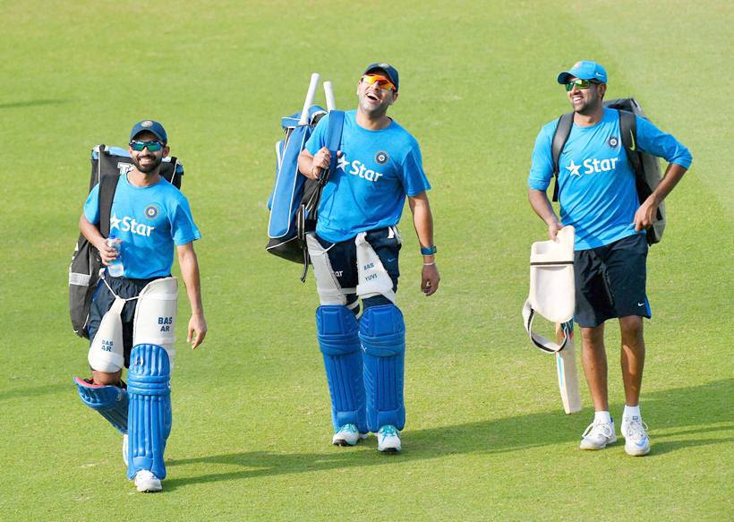 Mohali: R Ashwin, Yuvraj Singh and A Rehane after a training session n Mohali on Saturday. PTI Photo by Shahbaz Khan (PTI3_26_2016_000195A)