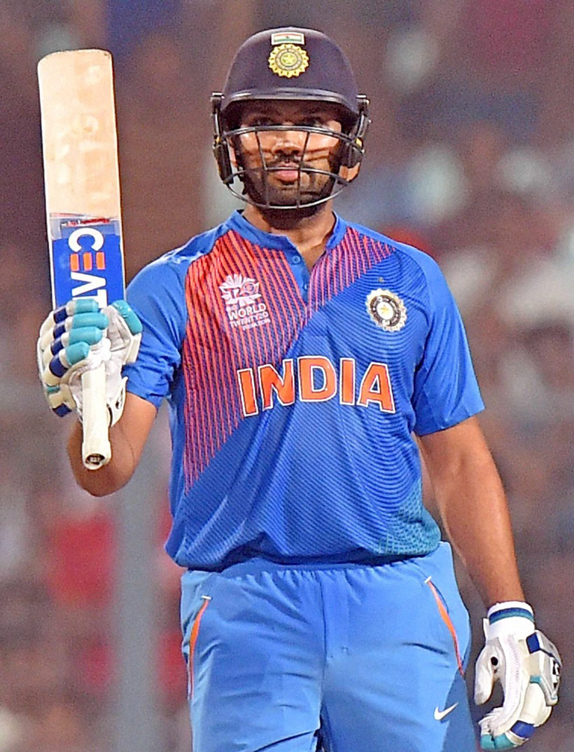 Kolkata: India's Rohit Sharma celebrates his fifty during a practice game against West Indies at Eden Garden in Kolkata on Thursday. PTI Photo by Ashok Bhaumik (PTI3_10_2016_000325A)