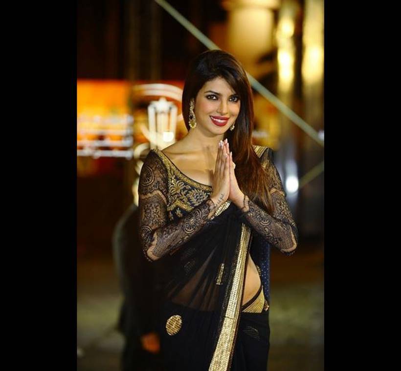 It's not uncommon to spot the pretty lass in saris for international red carpet events. Take a look at her pick of a gorgeous black and gold Ritu Kumar sari at the 2012 Marrakech Film Festival. The lace details on the blouse were breathtaking, and the sari showed off her curves perfectly. Luscious red lips with the black sari completed the fabulous look, don't you agree? (Source: Reuters)