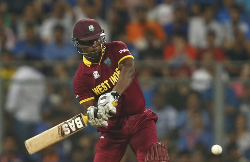India vs West Indies: At 19/2, with two key batsmen Chris Gayle and Marlon Samuels back, it looked like India are running away with it. But Johnson Charles took things into his own hands. The opening batsman took the game by the scruff of the neck and went after the Indian bowling. He brought up his fifty from 30 balls with seven fours and two sixes. However, his inning ended on 52 from 36 balls with Kohli taking the wicket. (Source: Reuters)