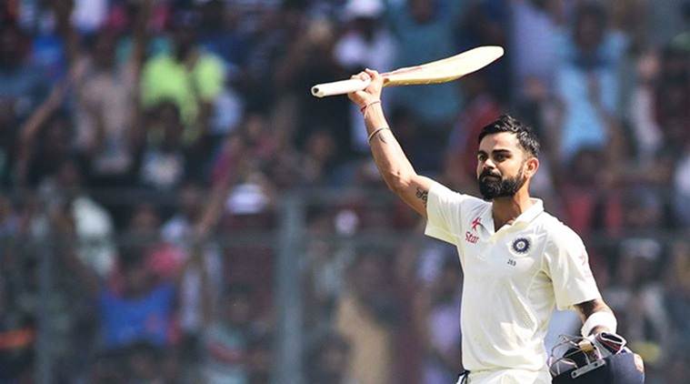 Captain Virat Kohli raise the bat and acknowledge the crowd after he was out for 235 runs going to pavlion against England on the 4th Day play at wankhade stadium. Express photo by Kevin D'Souza. Mumbai 11-12-2016. *** Local Caption *** Captain Virat Kohli raise the bat and acknowledge the crowd after he was out for 235 runs going to pavlion against England on the 4th Day play at wankhade stadium. Express photo by Kevin D'Souza. Mumbai 11-12-2016.