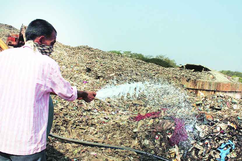 आधारवाडी कचराभूमीवर रसायनांची फवारणी करण्यात येत आहे.