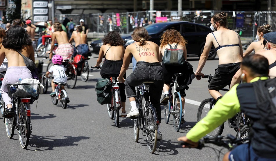 Berlin bike riders go topless For Gender Equality