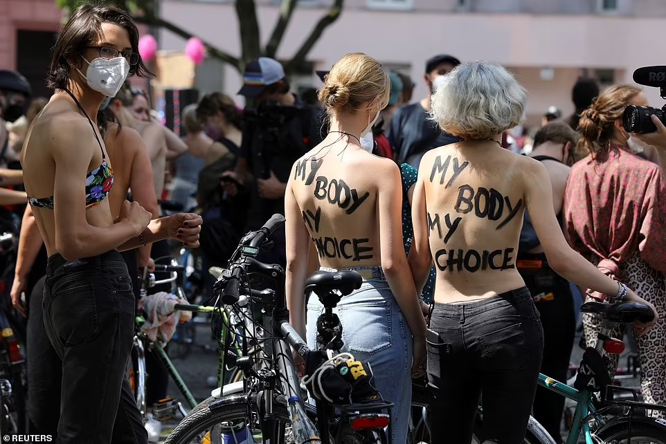 Berlin bike riders go topless For Gender Equality