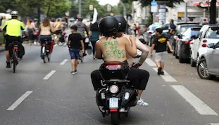 Berlin bike riders go topless For Gender Equality