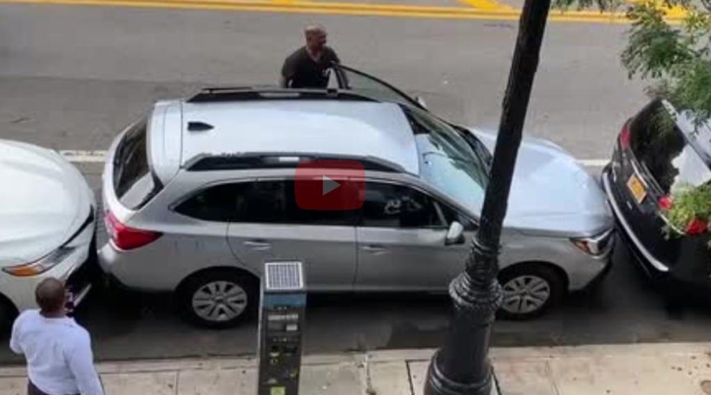 Man pulls out car from tight parking spot Watch Viral Video