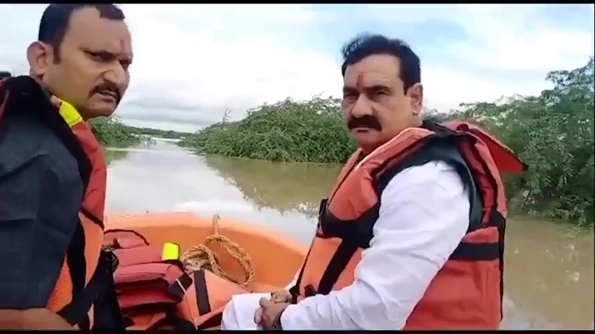 Madhya Pradesh Home Minister Narottam Mishra was airlifted after he got stuck at a flood affected Datia district