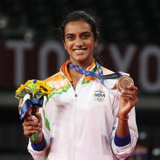 PV Sindhu with flowers