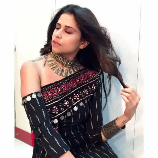 Actress Sai Tamhankar shoulder tattoo and other four tattoos meaning and connection with husband Ameya Gosavi