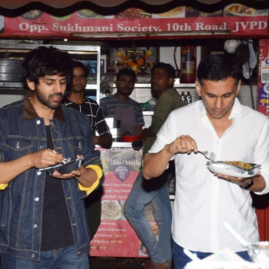 Chinese van food on Lamborghini bonnet Kartik Aaryan roadside foodscape on way back from Bigg Boss 15