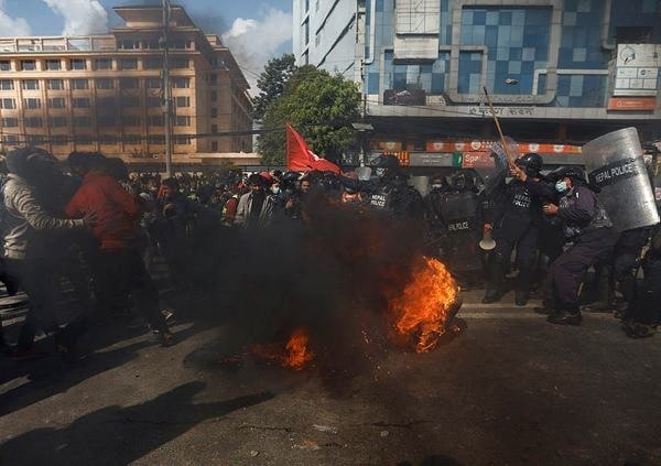 Police clash with protesters in Nepal over US grant