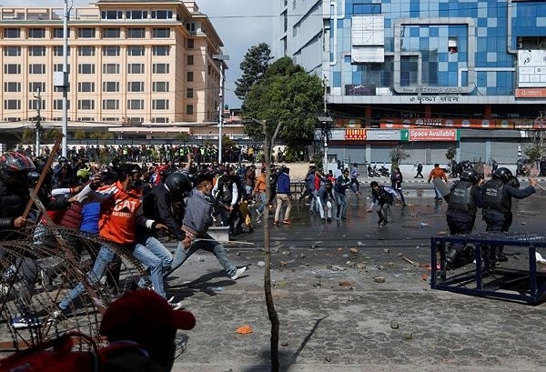 Police clash with protesters in Nepal over US grant