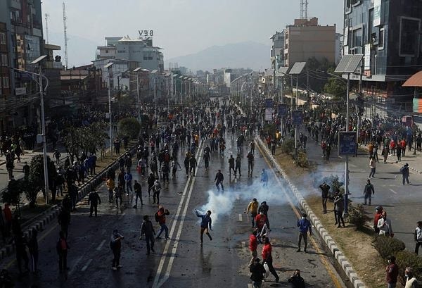 Police clash with protesters in Nepal over US grant