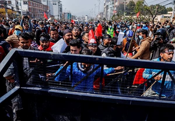 Police clash with protesters in Nepal over US grant