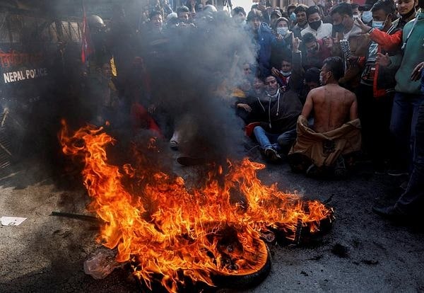 Police clash with protesters in Nepal over US grant