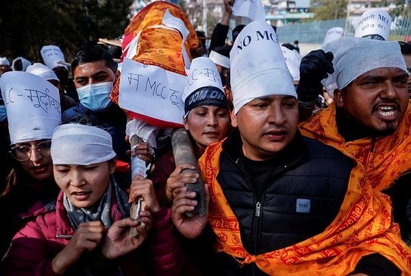 Police clash with protesters in Nepal over US grant