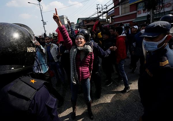 Police clash with protesters in Nepal over US grant