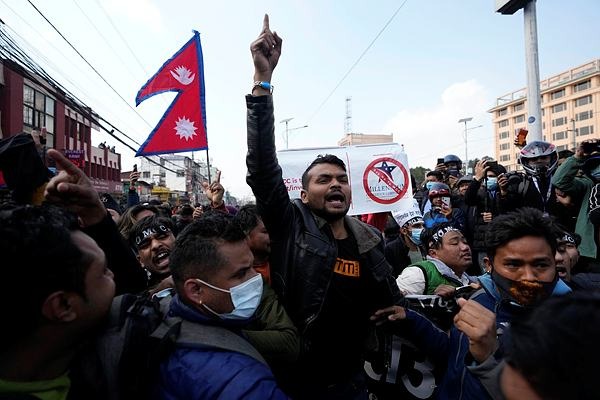 Police clash with protesters in Nepal over US grant