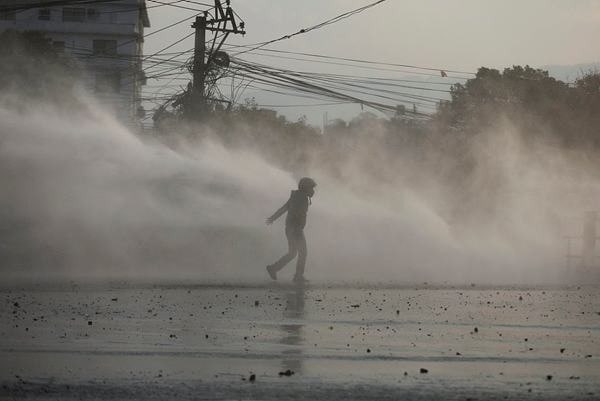 Police clash with protesters in Nepal over US grant