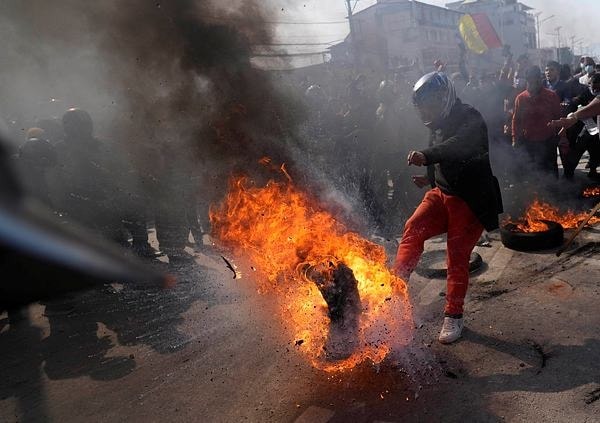 Police clash with protesters in Nepal over US grant