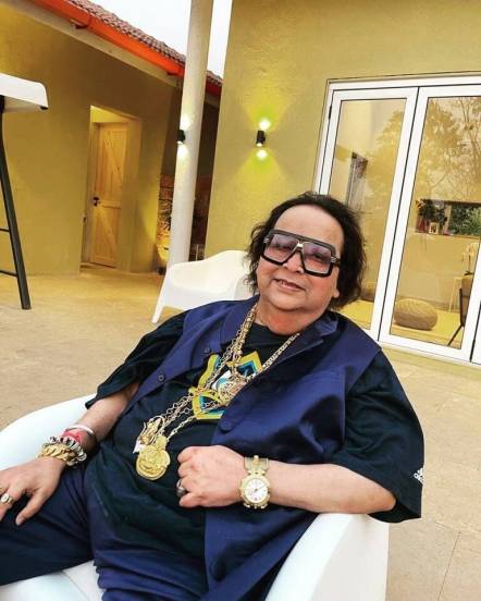 Bappi Lahiri net worth cars houses gold collection price