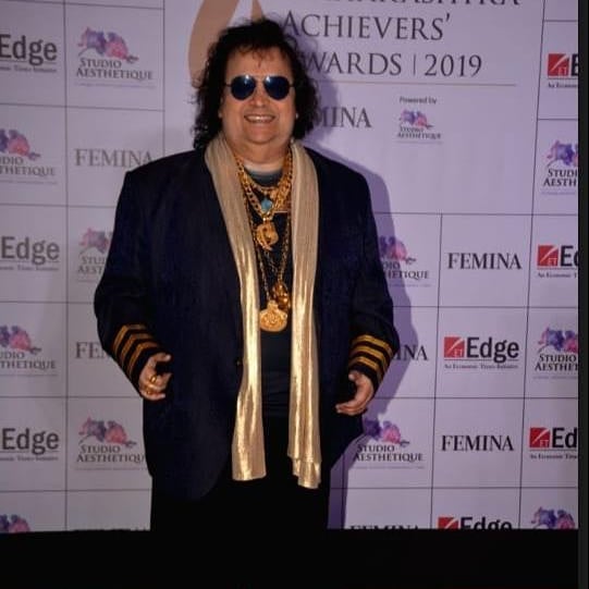 Bappi Lahiri net worth cars houses gold collection price