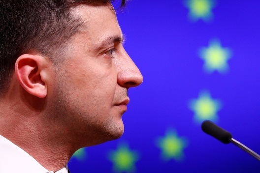 In military uniform defiant President Volodymyr Zelensky vows to defend Ukraine People called him real hero