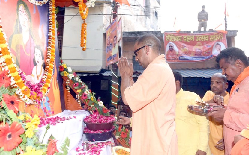 With sunglasses toy bulldozer Yogi Adityanath celebrates Holi in Gorakhpur See pics