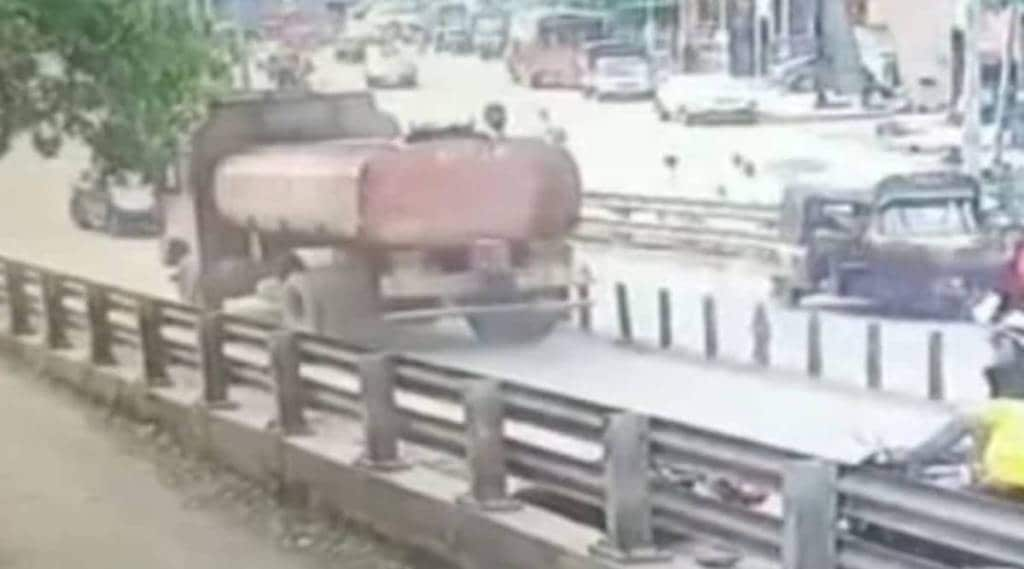 Woman dies after falling under tanker