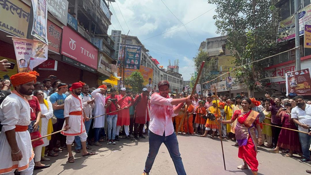 rohit pawar ganpati visarjan mirvnuk 2022 pune photos