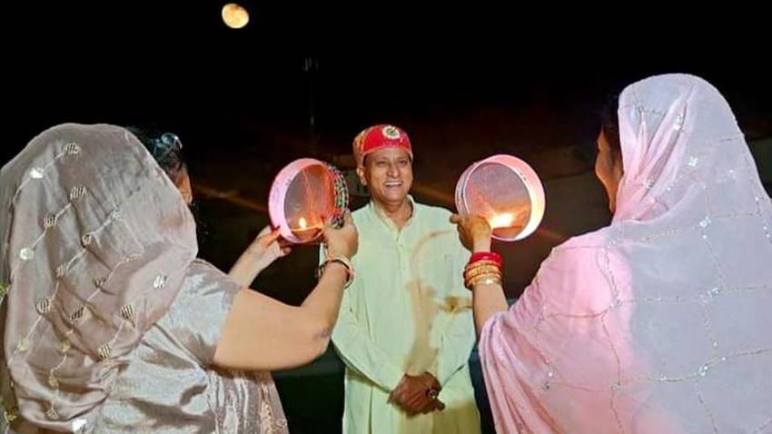 BJP MP Arjunlal Meena Celebrates karwa Chauth With Two Wives Who are Sisters Watch Unseen photos