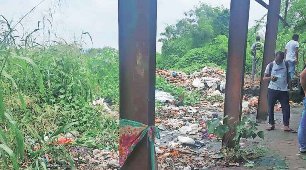 garbage piles near subway of naigaon railway station