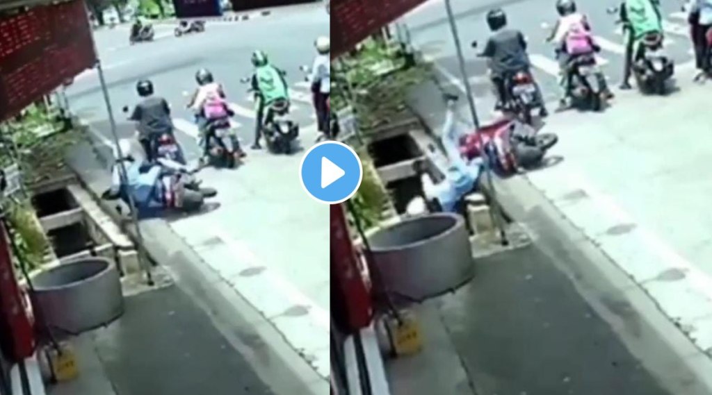 girl fell down from scooty in gutter