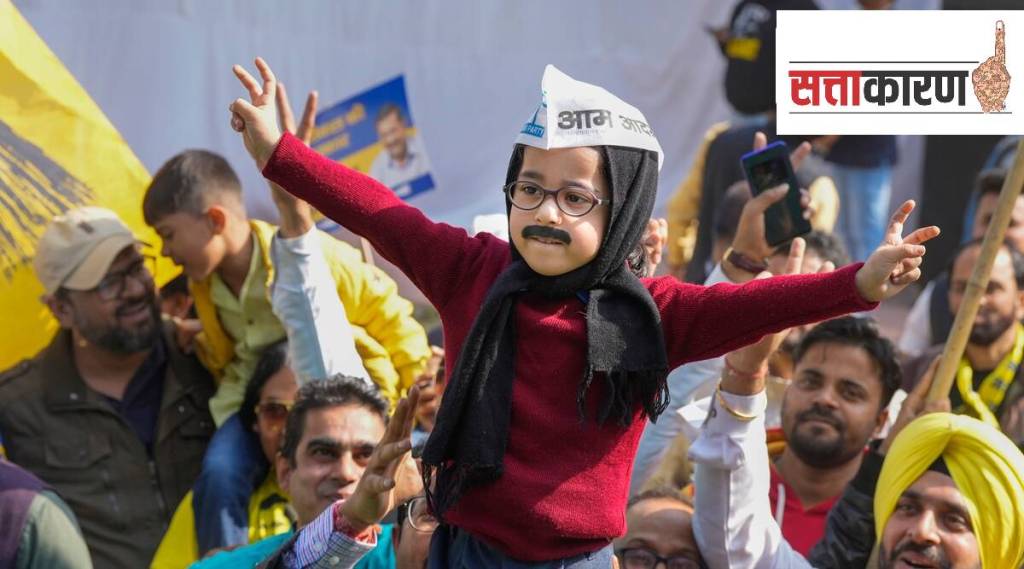 A child dressed as Delhi Chief Minister Arvind Kejriwal takes part in the celebrations of AAP's victory in the MCD polls, in New Delhi