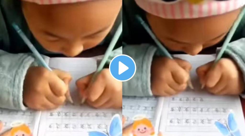 Viral Video little girl is seen writing with both her hands her talent will surprise you