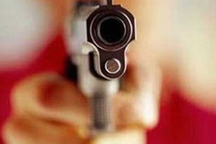 businessman gun fire on youth pune