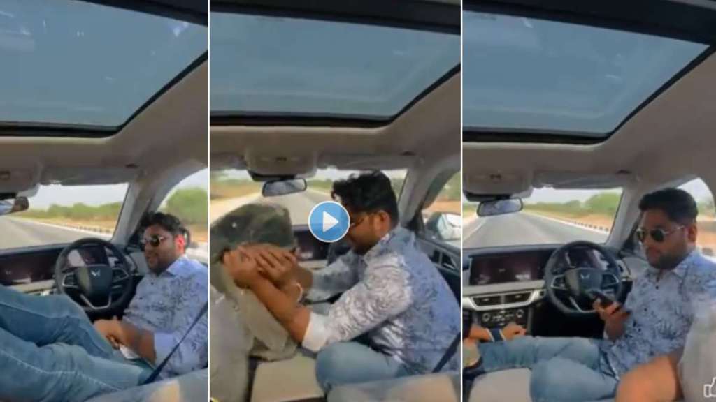 Viral Video : Man leaves car's steering wheel while driving to make Instagram reel with wife