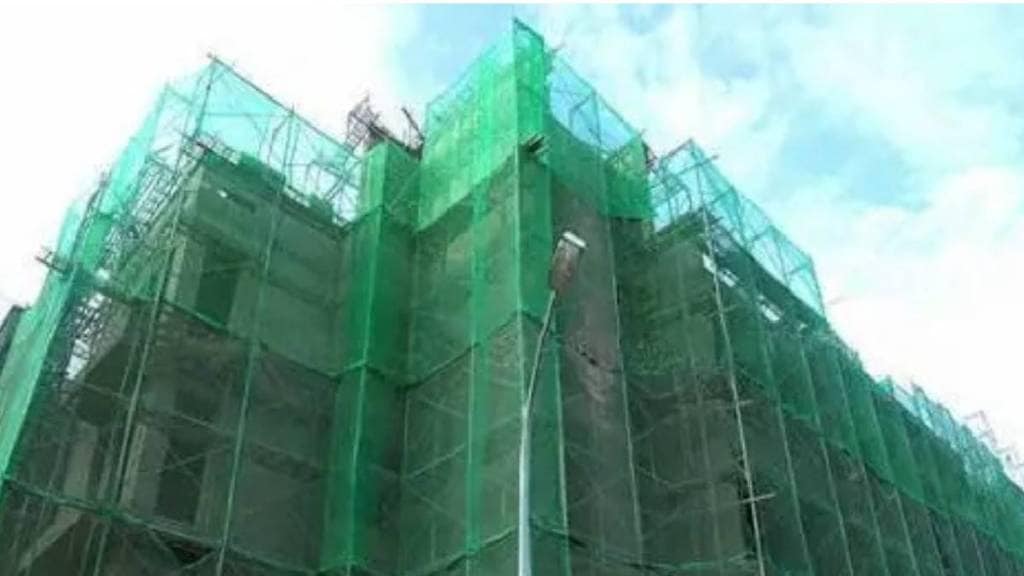 why building are covered by green cloth