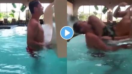 young man suddenly falls into the swimming pool