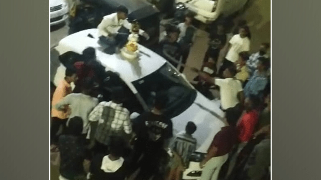 sahakarnagar birthday party cut cake sword sitting roof car pune