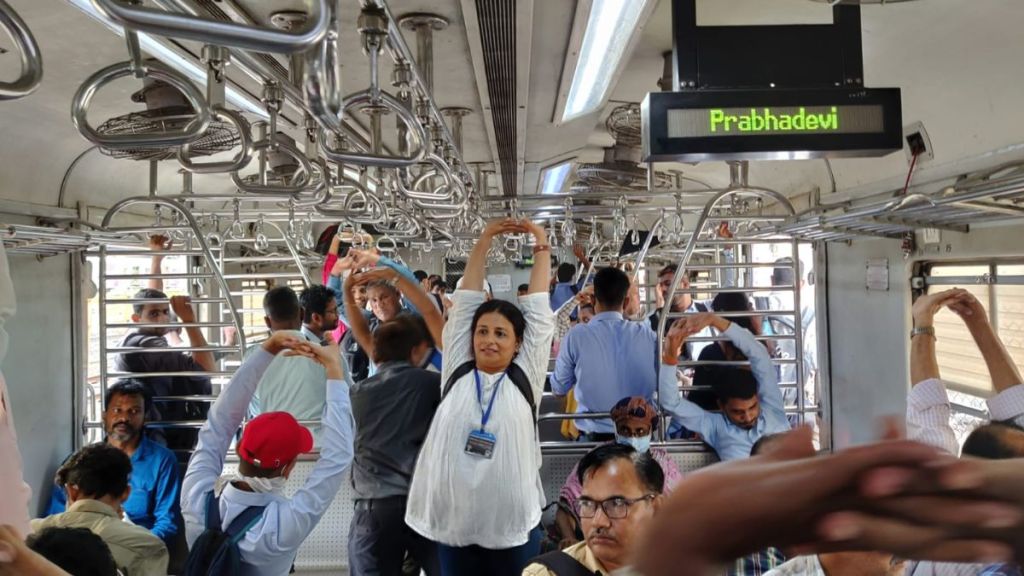 International Yoga Day Passengers perform Yoga inside a Mumbai local train